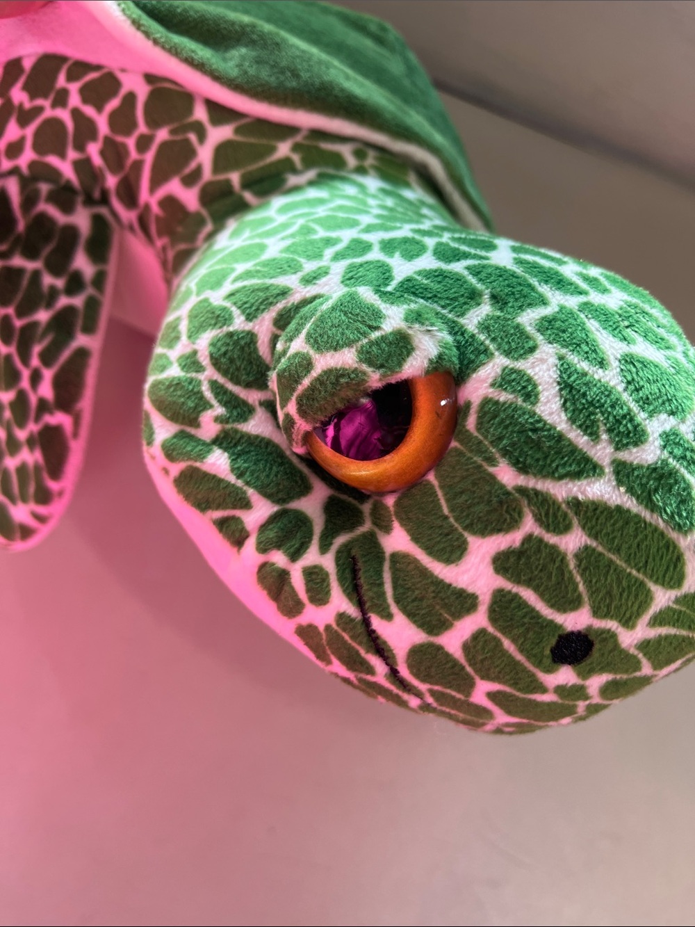 Green Patterned Plush Turtle Toy with Amber Eye Accent
